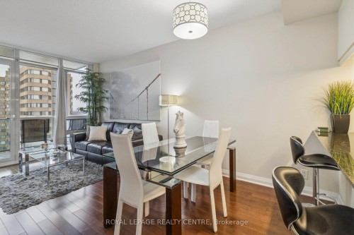 1503-1055 Southdown Road, Mississauga, ON - Indoor Photo Showing Dining Room With Fireplace