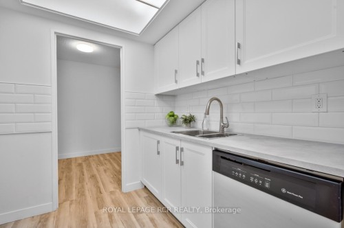 205-1535 Lakeshore Road E, Mississauga, ON - Indoor Photo Showing Kitchen With Double Sink