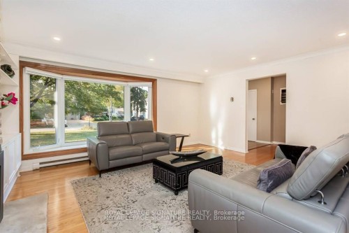 153 Ulster Drive, Oakville, ON - Indoor Photo Showing Living Room With Fireplace