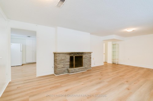 2 Millgate Crescent, Toronto, ON - Indoor Photo Showing Living Room With Fireplace