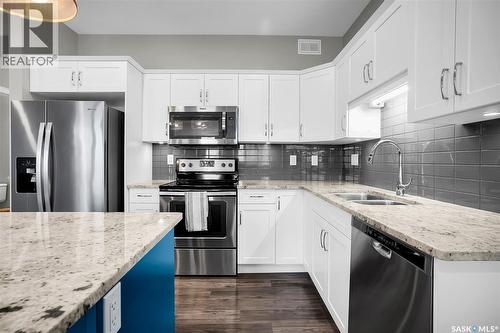 22 115 Veltkamp Crescent, Saskatoon, SK - Indoor Photo Showing Kitchen With Stainless Steel Kitchen With Double Sink With Upgraded Kitchen