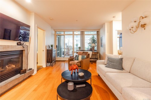 Cy04-38 Front St, Nanaimo, BC - Indoor Photo Showing Living Room With Fireplace