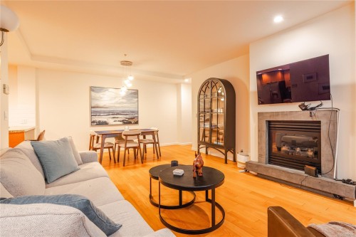 Cy04-38 Front St, Nanaimo, BC - Indoor Photo Showing Living Room With Fireplace