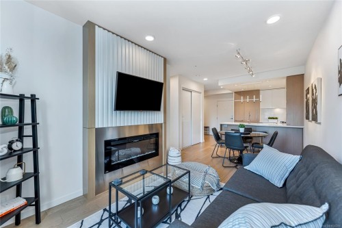 405-1033 Cook St, Victoria, BC - Indoor Photo Showing Living Room With Fireplace