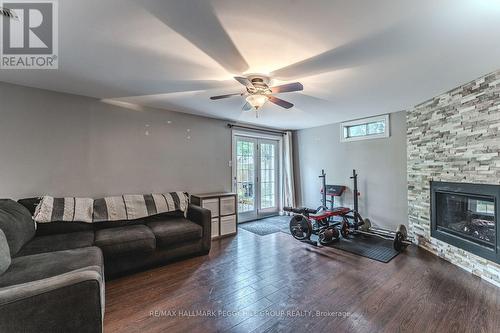 69 Fox Run, Barrie, ON - Indoor Photo Showing Living Room With Fireplace