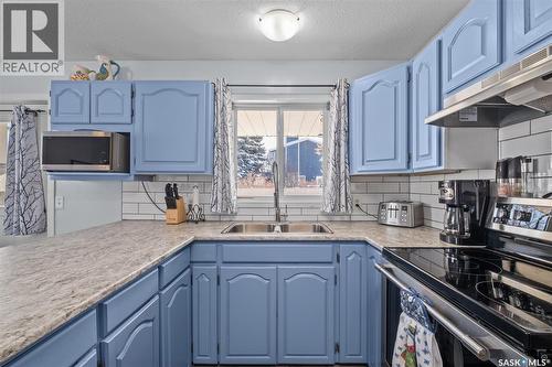 1503 Bliss Crescent, Prince Albert, SK - Indoor Photo Showing Kitchen With Double Sink