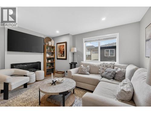 2081 11 Avenue Ne Unit# 9, Salmon Arm, BC - Indoor Photo Showing Living Room With Fireplace