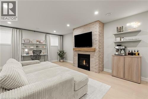 27 Maple Leaf Avenue S, Ridgeway, ON - Indoor Photo Showing Other Room With Fireplace
