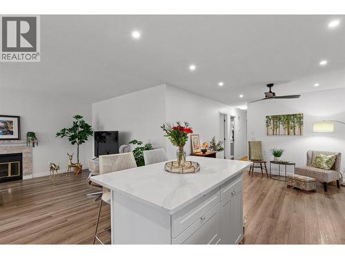 1255 Raymer Avenue Unit# 120, Kelowna, BC - Indoor Photo Showing Living Room With Fireplace