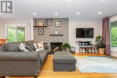 9 Newbury Avenue, Ottawa, ON - Indoor Photo Showing Living Room With Fireplace