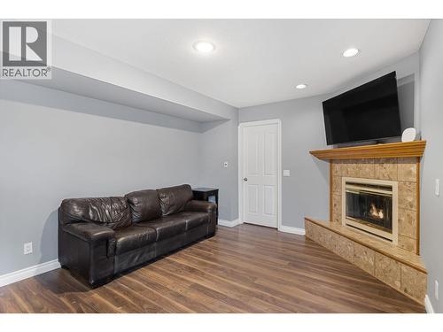 1879 Portland Avenue, Kelowna, BC - Indoor Photo Showing Living Room With Fireplace