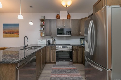408-866 Brock Ave, Langford, BC - Indoor Photo Showing Kitchen With Stainless Steel Kitchen With Double Sink