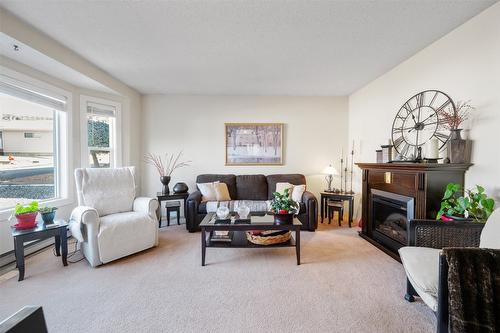 15-3096 South Main Street, Penticton, BC - Indoor Photo Showing Living Room With Fireplace