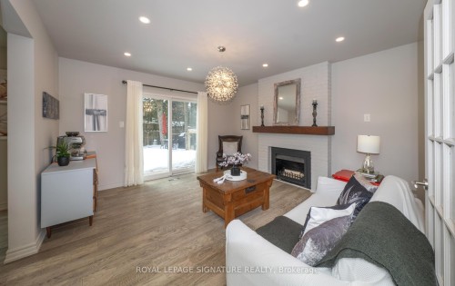 6 Deerbrook Trail, Toronto, ON - Indoor Photo Showing Living Room With Fireplace