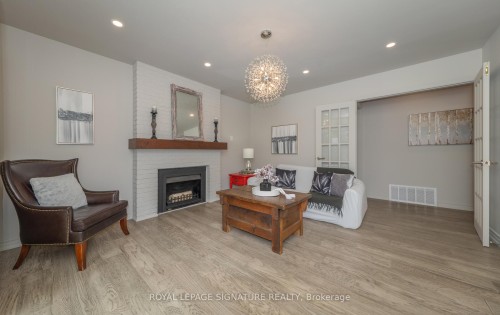 6 Deerbrook Trail, Toronto, ON - Indoor Photo Showing Living Room With Fireplace