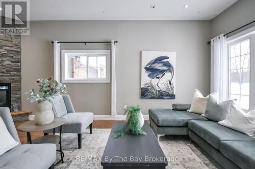 111 Balm Beach Road E, Tiny, ON - Indoor Photo Showing Living Room With Fireplace