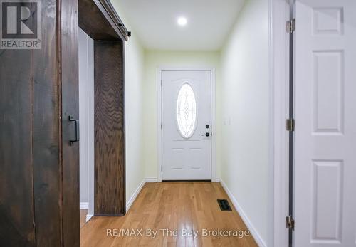 Separate Entrance - 111 Balm Beach Road E, Tiny, ON - Indoor Photo Showing Other Room