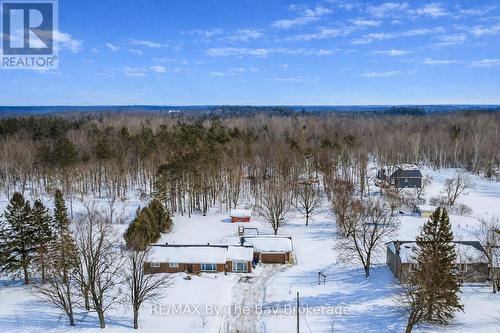 Backs onto a wooded area - 111 Balm Beach Road E, Tiny, ON - Outdoor With View