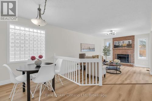 1 Balfour Court, Guelph (Kortright East), ON - Indoor Photo Showing Other Room With Fireplace