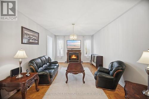 3395 Trelawny Circle, Mississauga, ON - Indoor Photo Showing Living Room With Fireplace