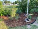 Professional Landscaped back yard - 111 2Nd Avenue S, Swan River, MB  - Outdoor 