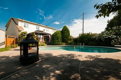 Cour - 306 Rue De Normandie, Sainte-Julie, QC - Outdoor With In Ground Pool