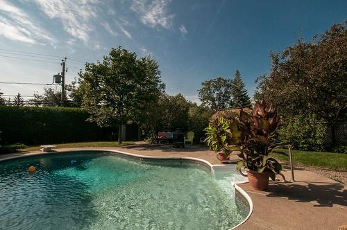 Piscine - 306 Rue De Normandie, Sainte-Julie, QC - Outdoor With In Ground Pool With Backyard