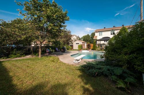 Cour - 306 Rue De Normandie, Sainte-Julie, QC - Outdoor With In Ground Pool