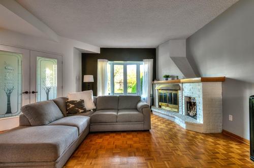 Salon - 306 Rue De Normandie, Sainte-Julie, QC - Indoor Photo Showing Living Room With Fireplace