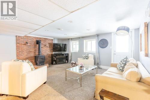 104 Cameron Drive, Kawartha Lakes (Fenelon), ON - Indoor Photo Showing Living Room With Fireplace