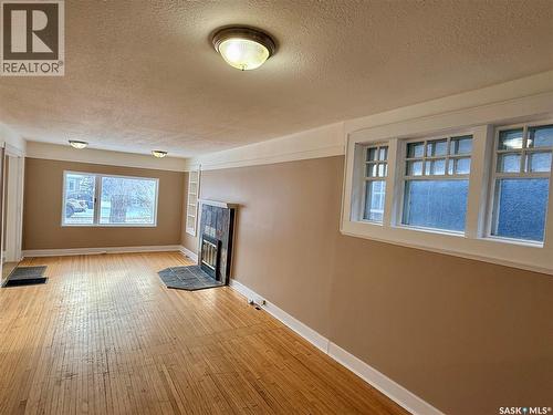 824 College Avenue, Regina, SK - Indoor Photo Showing Other Room With Fireplace