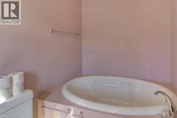 Ensuite bathroom with deep soaker tub. - 