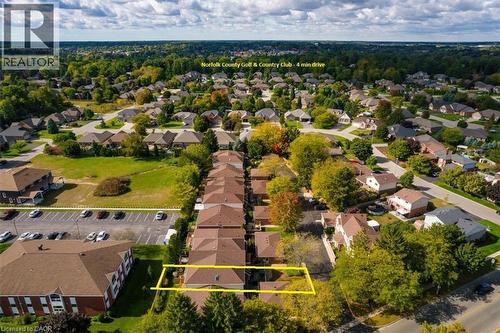 Golf enthusiasts will love being close to the Norfolk Golf & Country Club, just a short 3 minute drive away. - 42 Donly Drive S Unit# 2, Simcoe, ON - Outdoor With View