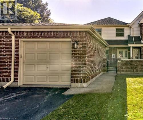 The shared detached garage provides secure parking and extra storage space for all your needs. - 42 Donly Drive S Unit# 2, Simcoe, ON - Outdoor