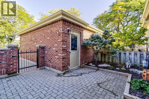 Access your private front patio easily through the garage, creating a seamless indoor-outdoor living experience. - 42 Donly Drive S Unit# 2, Simcoe, ON - Outdoor