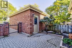 Access your private front patio easily through the garage, creating a seamless indoor-outdoor living experience. - 