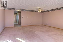 This versatile living space has room to add a dining table, making it ideal for hosting friends or family dinners. - 