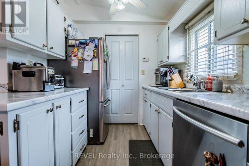115 - 3033 Townline Road, Fort Erie (Black Creek), ON - Indoor Photo Showing Kitchen With Double Sink