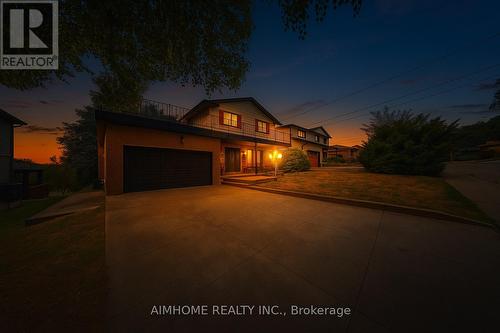 House Exterior in Twilight - 23 Hildegard Drive, Hamilton, ON - 