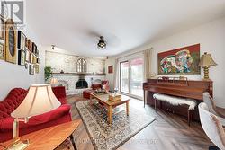 Main Floor Family Room w Fireplace I - 