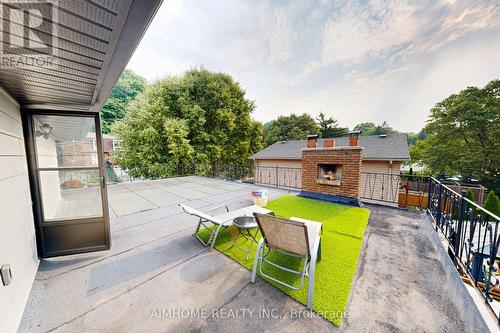 Second Floor Terrace with fireplace and the view - 23 Hildegard Drive, Hamilton, ON - Outdoor With Exterior