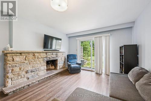 25 - 288 Westcourt Place, Waterloo, ON - Indoor Photo Showing Living Room With Fireplace