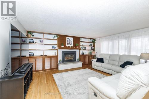 Built ins and gas fireplace - 467 Gorham Rd Road, Fort Erie (Point Abino), ON - Indoor Photo Showing Living Room With Fireplace