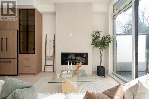 72 Marmot Street, Toronto, ON - Indoor Photo Showing Living Room With Fireplace