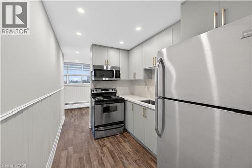 212 Kerr Street Unit# 702, Oakville, ON - Indoor Photo Showing Kitchen With Stainless Steel Kitchen With Upgraded Kitchen