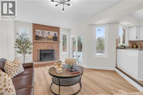 1 Balfour Court, Guelph, ON - Indoor Photo Showing Living Room With Fireplace