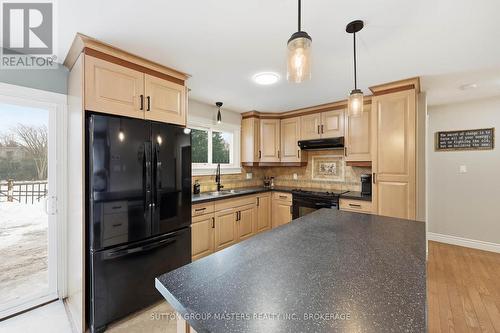3837 Holmes Road, Frontenac (Frontenac South), ON - Indoor Photo Showing Kitchen With Double Sink