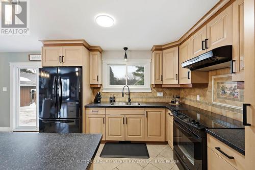 3837 Holmes Road, Frontenac (Frontenac South), ON - Indoor Photo Showing Kitchen With Double Sink