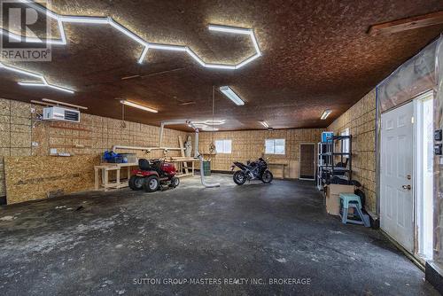 3837 Holmes Road, Frontenac (Frontenac South), ON - Indoor Photo Showing Garage