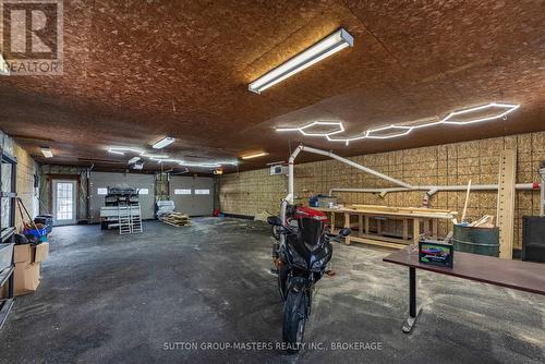 3837 Holmes Road, Frontenac (Frontenac South), ON - Indoor Photo Showing Garage